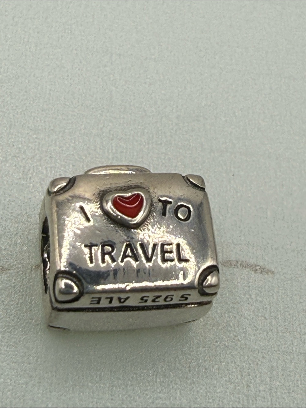 Pandora “Love to Travel Charm